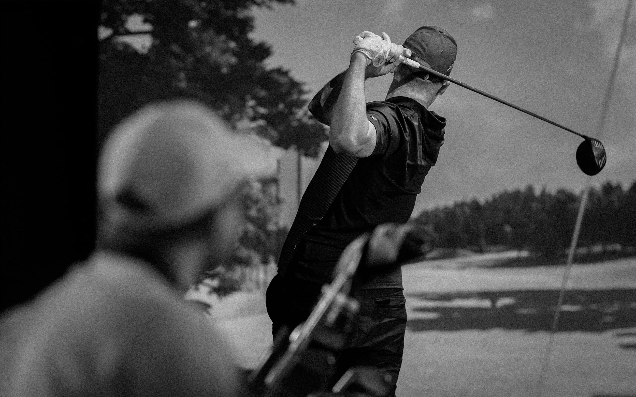 simulatorexperience_TrackMan_1280x800px_300ppi_BW.jpg